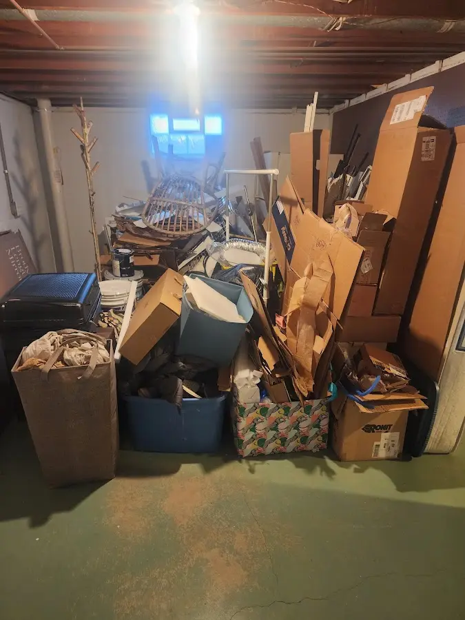 Roll-off dumpster container at job site for Yard Waste Dumpster Rental in Roscoe